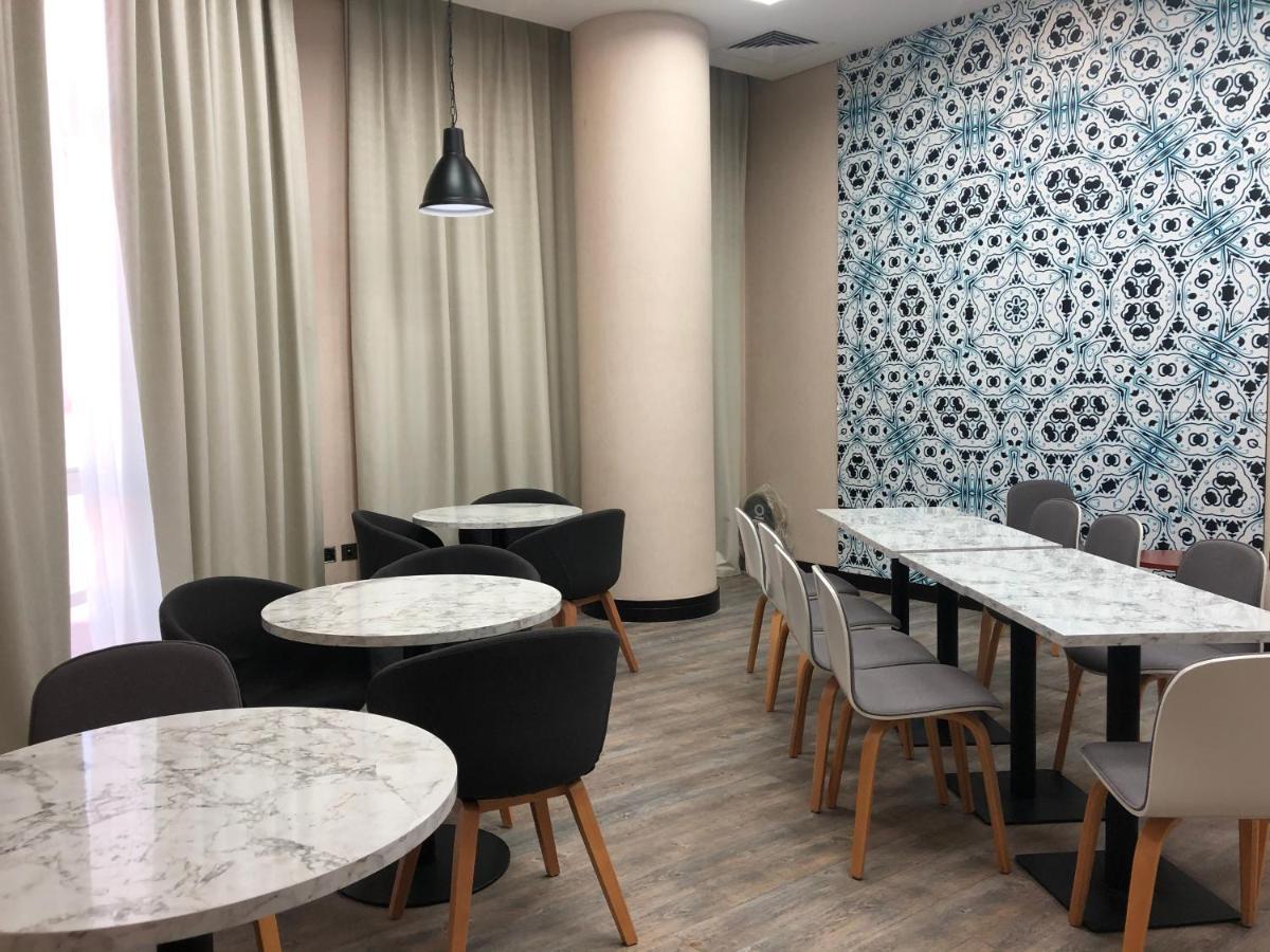 Отель Time Express Al Khan